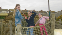 The girls having fun on the crazy golf at Hunstanton