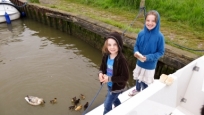 Joely and Nina feeding the ducks at St Olaves