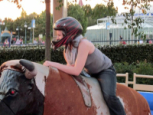 Sally riding the bull