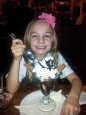 Nina with an extra large chocolate sundae